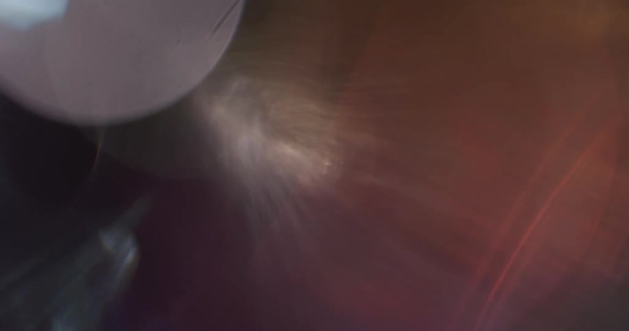 Light rays move through the area creating various shapes in multiple colors