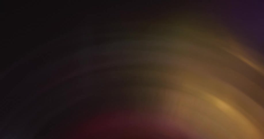 Arched reflection of light flares against a black background