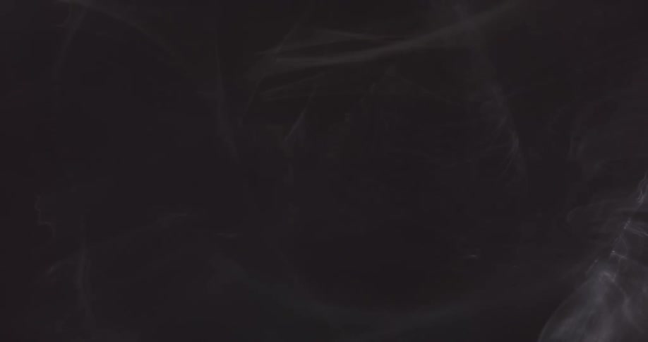 Reflection of light flares against a black background