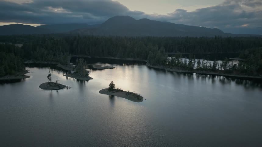 Aerial view of small islands next to the coast at evening