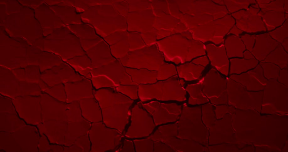 Abstract red soil cracking