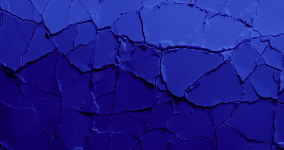 Movement breaks and cracks blue surface
