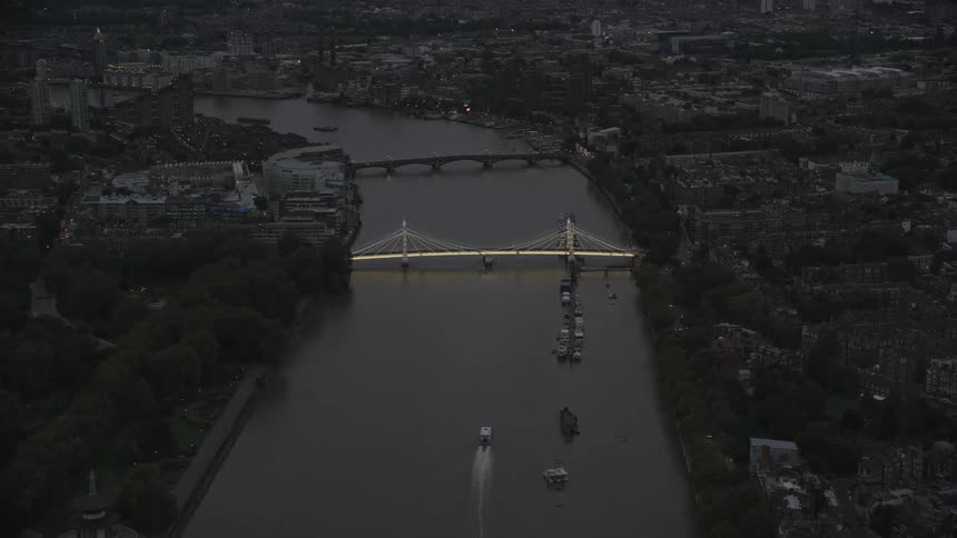 Aerial view of a city by the edge of a central lake