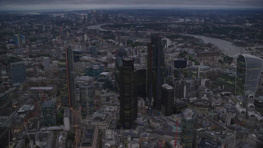 Aerial view of skyscrapers and buildings near the river in the city