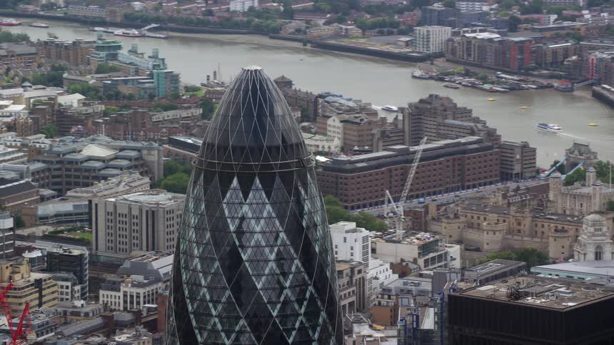 Construction sites stand near bullet shaped tower a distance from london bridge