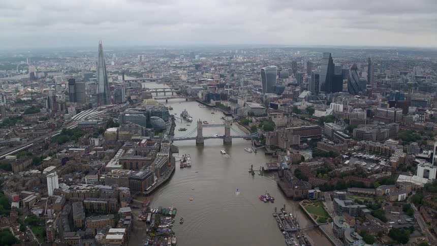 Aerial panorama of the river thames the iconic tower bridge and the sprawling london skyline