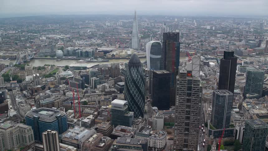 Aerial of glass tower in metropolitan city
