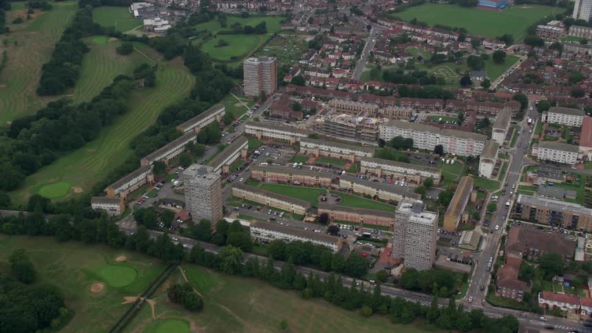 A residential area close to large grass fields
