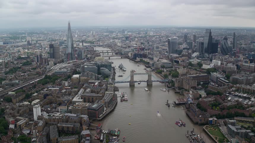 Aerial panorama of the river thames the iconic tower bridge and the sprawling london skyline
