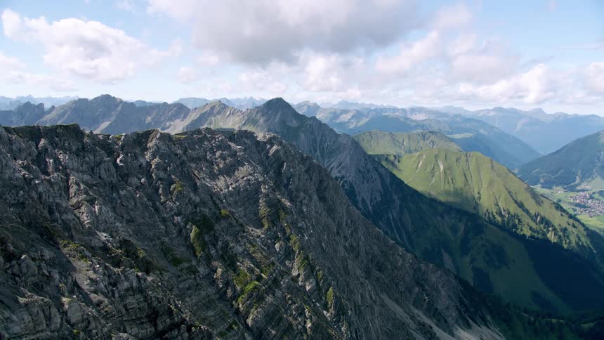 Aerial view of a mountain range and peaks