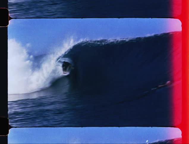 Man surfing and getting barreled in a wave