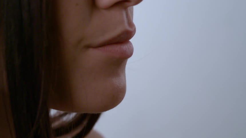 A womans face with emphasis on her lips