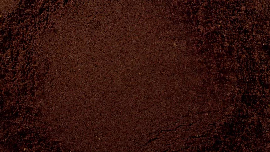 A pile of dirt turns into a sinking hole full of dirt