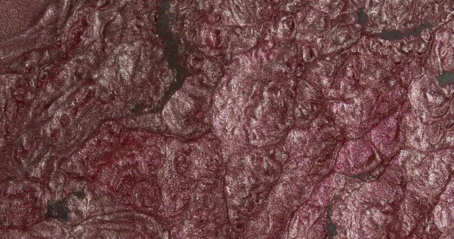 Flowing abstract liquid glitter inks with shiny reflecting particles
