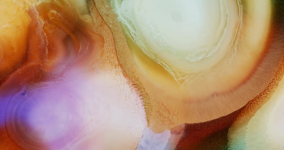 Abstract shapes created with flowing pearl inks background