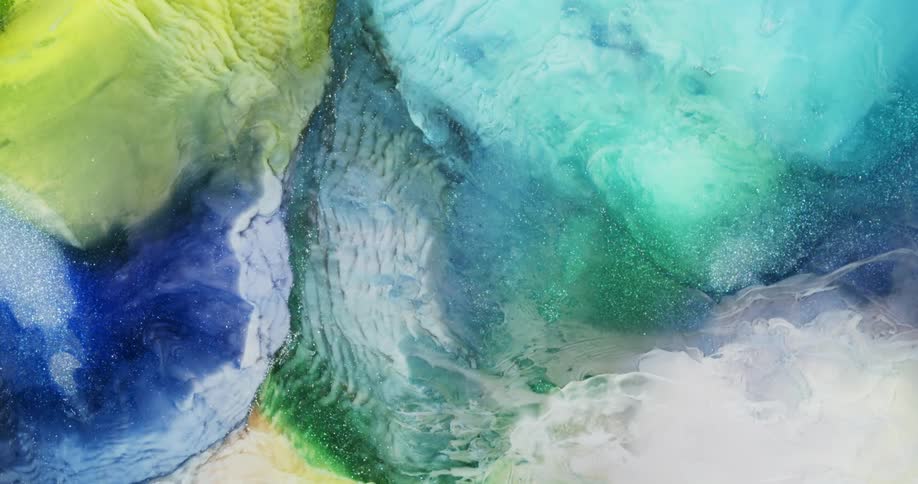 Colorful abstract shapes of blooming liquid metallic ink