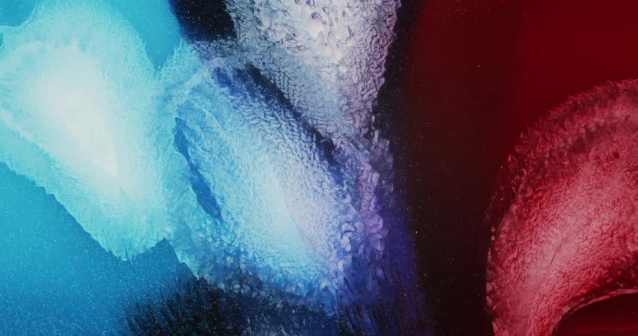 Moving fluid inks shapes reflecting light