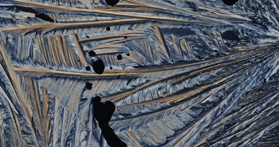 Growing crystals of sulfur liquid moving in abstract motion