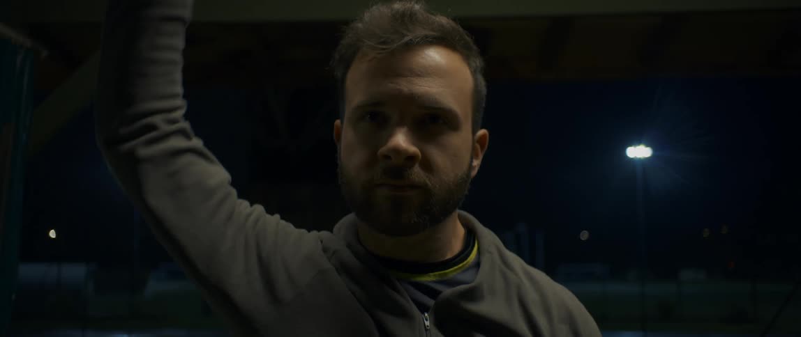 Portrait of a man stretching his arms
