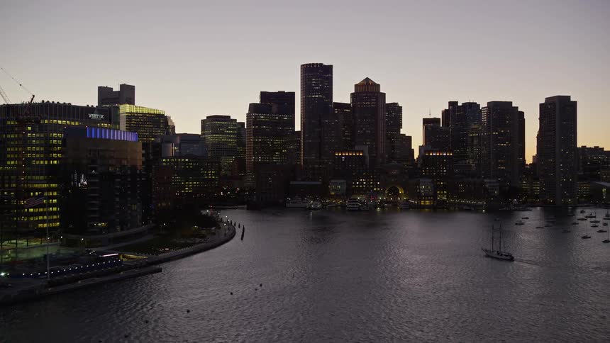 Landscape of skyscrapers in a metropolitan area at sunset