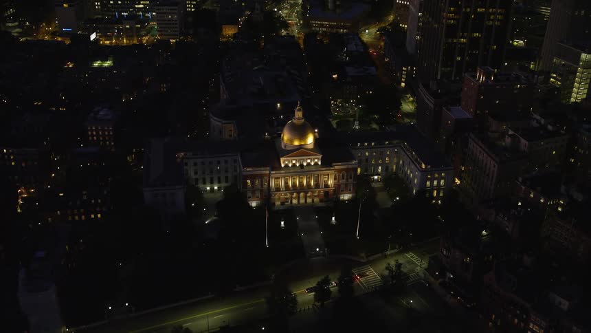 Aerial view of a metropolis and public places at night