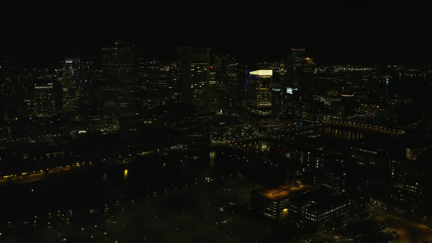 A panoramic view of a night city illuminated by residential lights