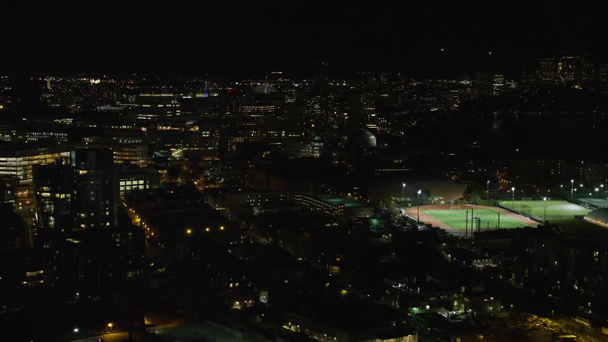 A night city with a sports field and little lighting