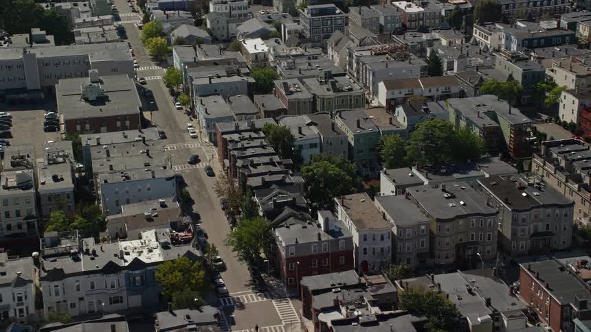 Aerial view of the streets and buildings of a small city