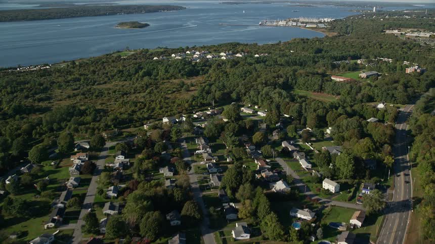 Aerial panorama of an urban city by the sea