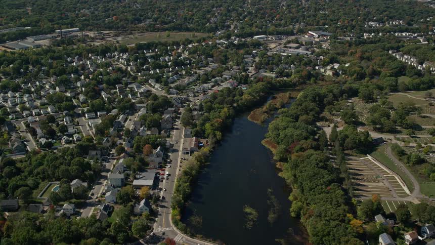 Aerial panorama of an urban neighborhood by a river
