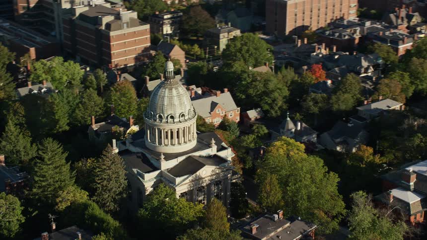 Aerial view of a domed building in a neighborhood
