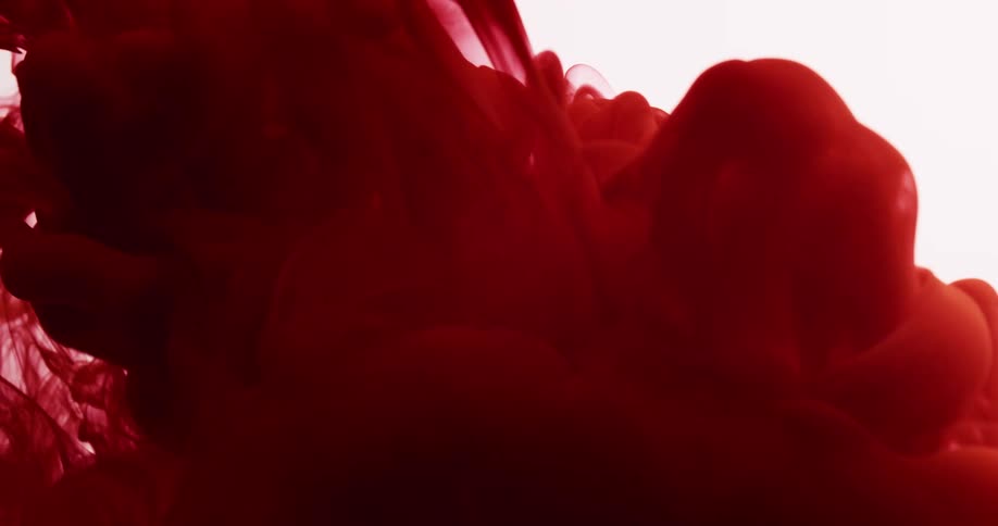 Abstract red ink fluid in motion