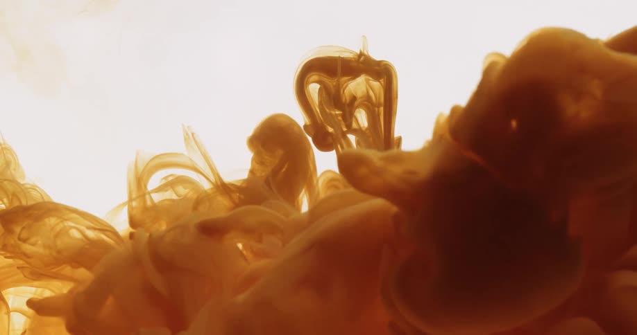 Abstract yellow smoke being released on a white background