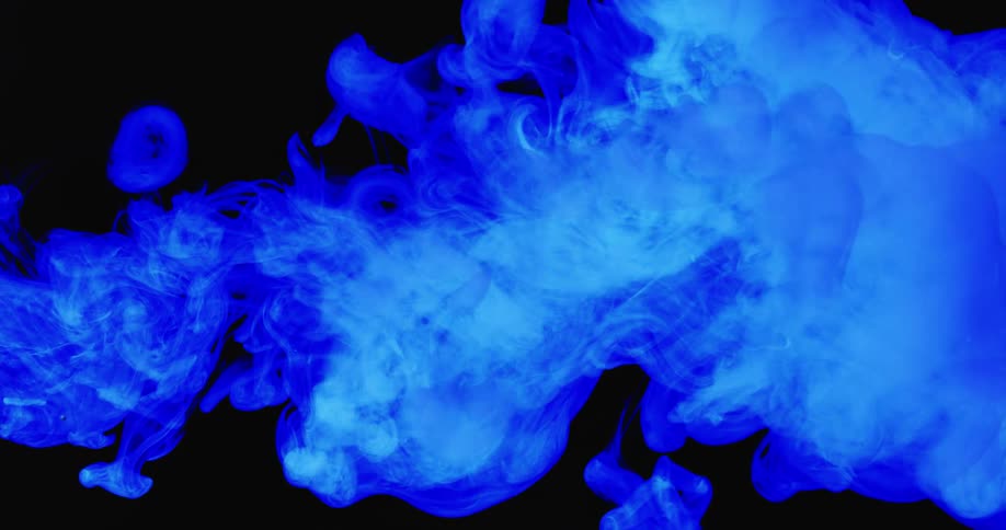 Blue smoke shoots out filling the area
