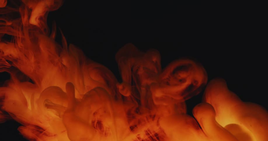 Abstract firecolored smoke in motion on a black background
