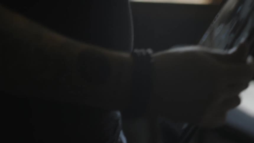 A man is using a tablet