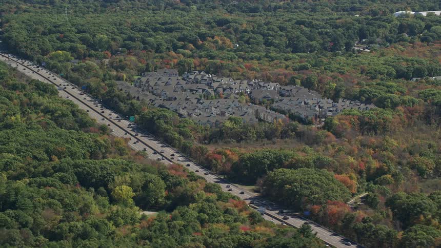 Moving cars on a freeway at midday
