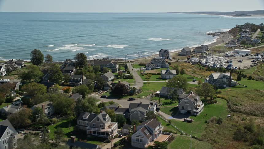 Aerial view of oceanfront homes and dry docked boats