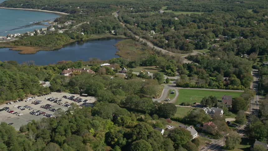 A region with a dense forest and a lake close to the sea