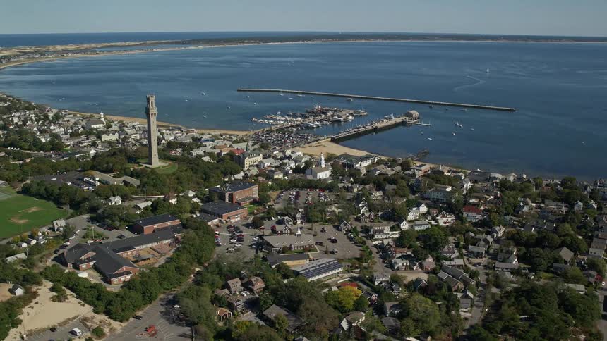 A harbor is by the coastal town
