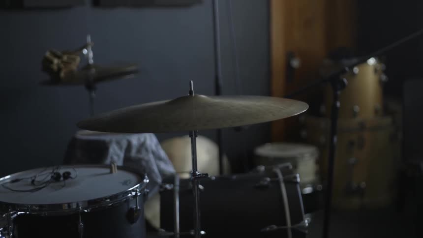 Drums line this small room