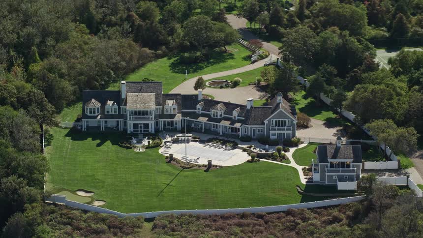 Aerial drone view of a mansion in the suburbs