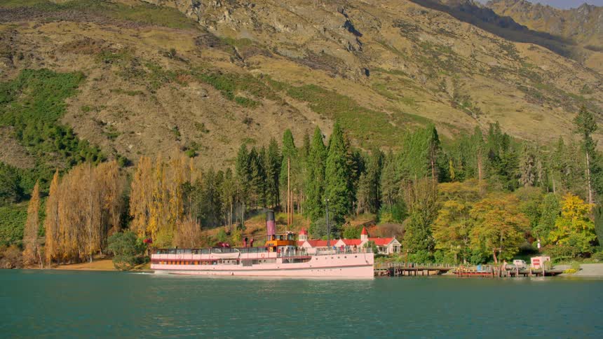 A steamship is passing the pier