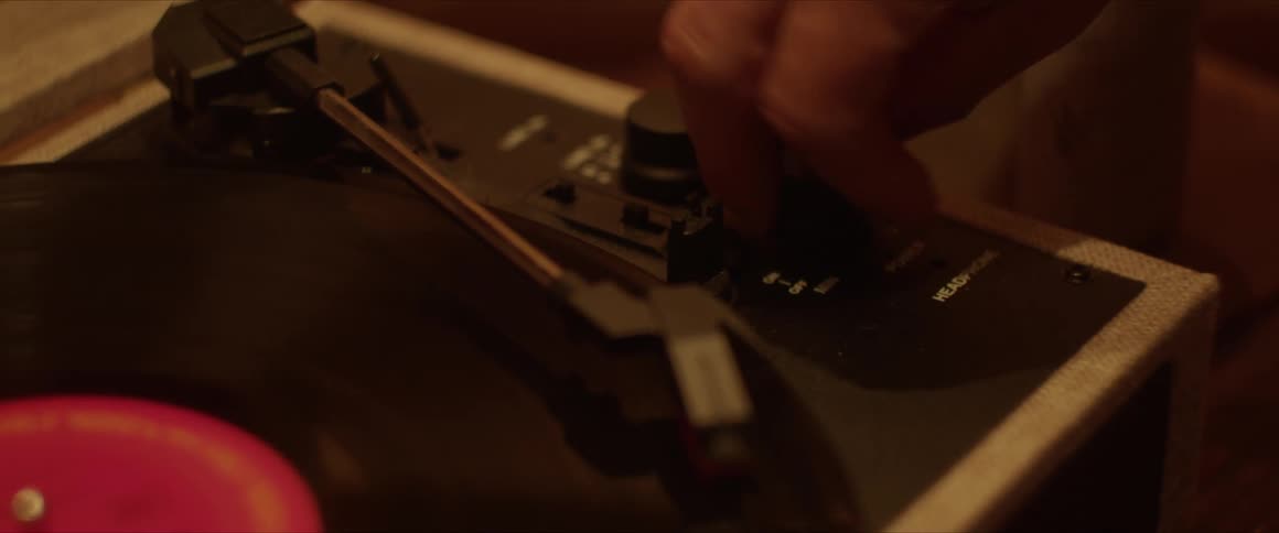 A vinyl record playing on the record player