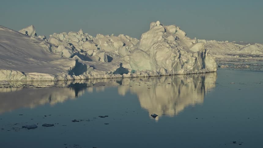 An arctic region with icecovered land facing water