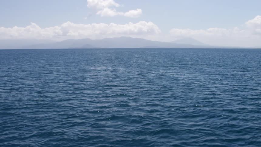 The water is rough on a cloudy day