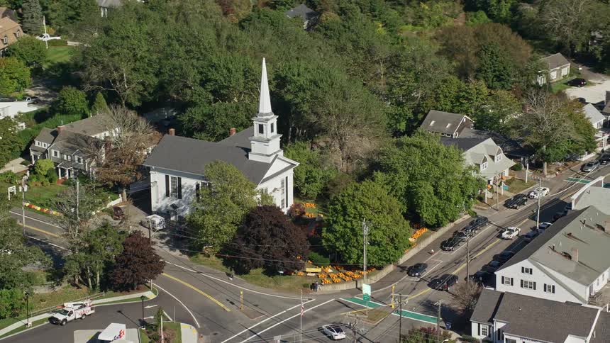 Aerial view of first congregational church an intersection and buildings in the city