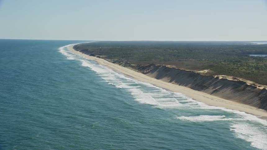 Aerial panorama of a long stretch of sand and beach