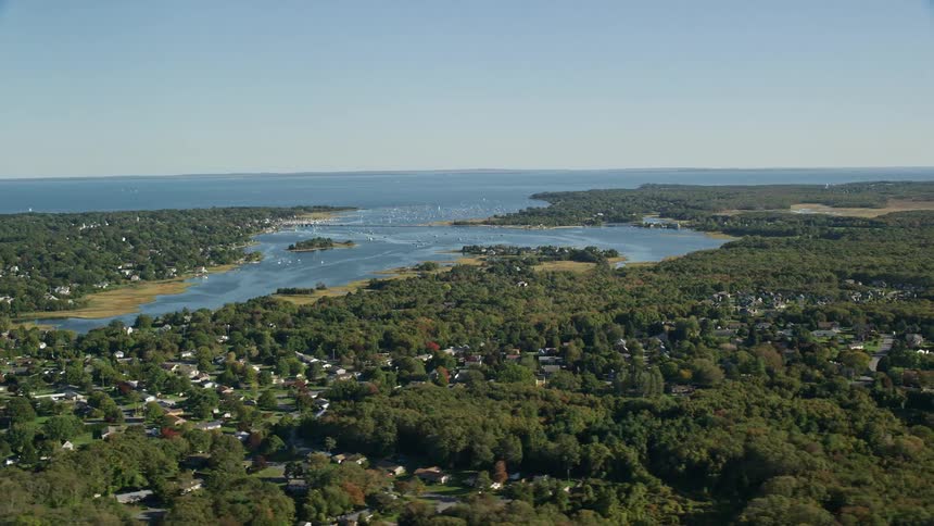 A small town sits by the shore