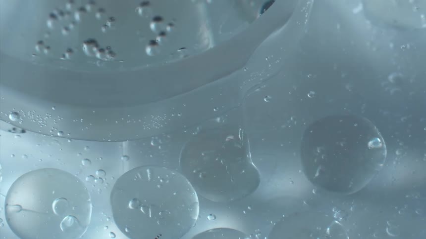 Moving bubbles in an abstract dense liquid